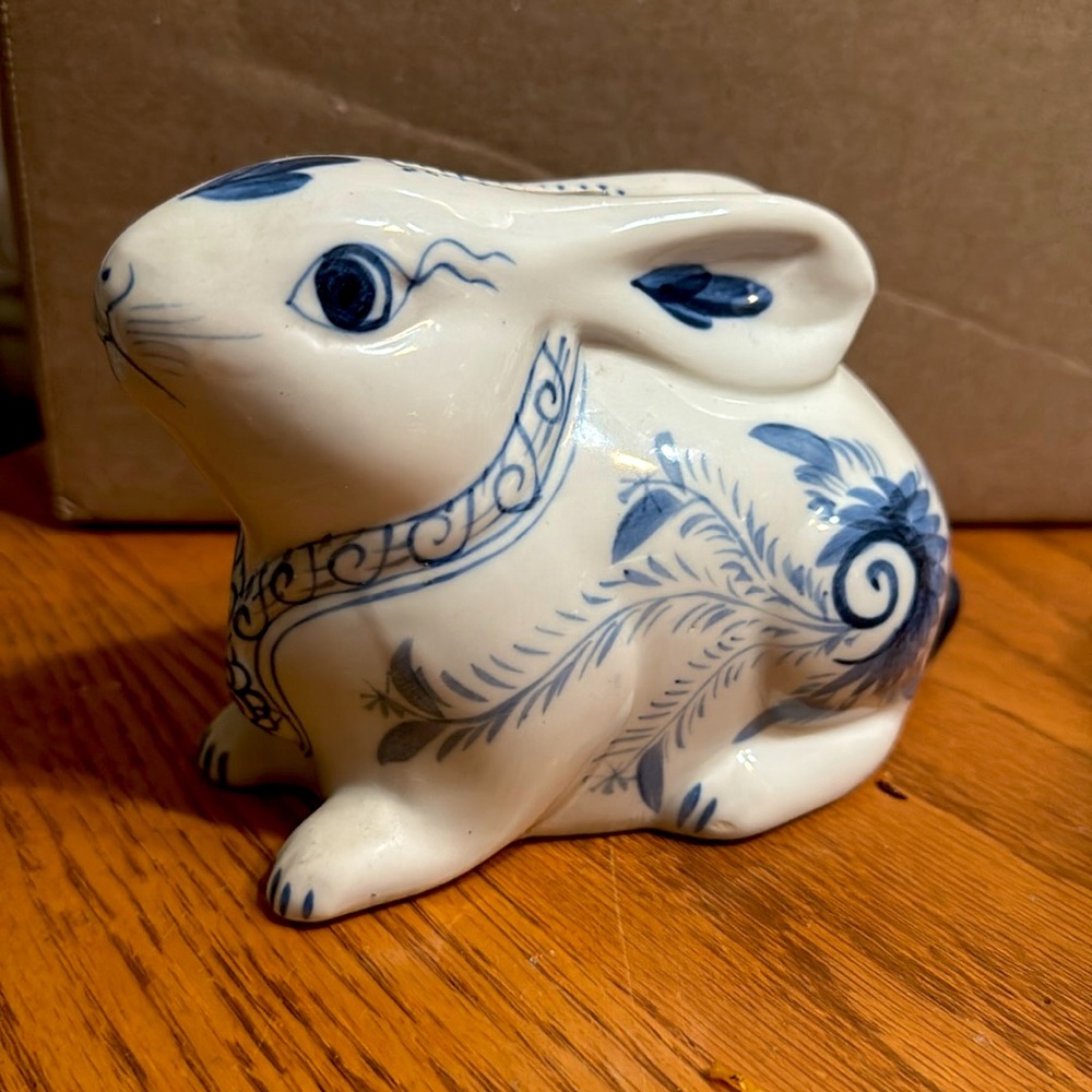 Blue and white ceramic bunny bank with stopper